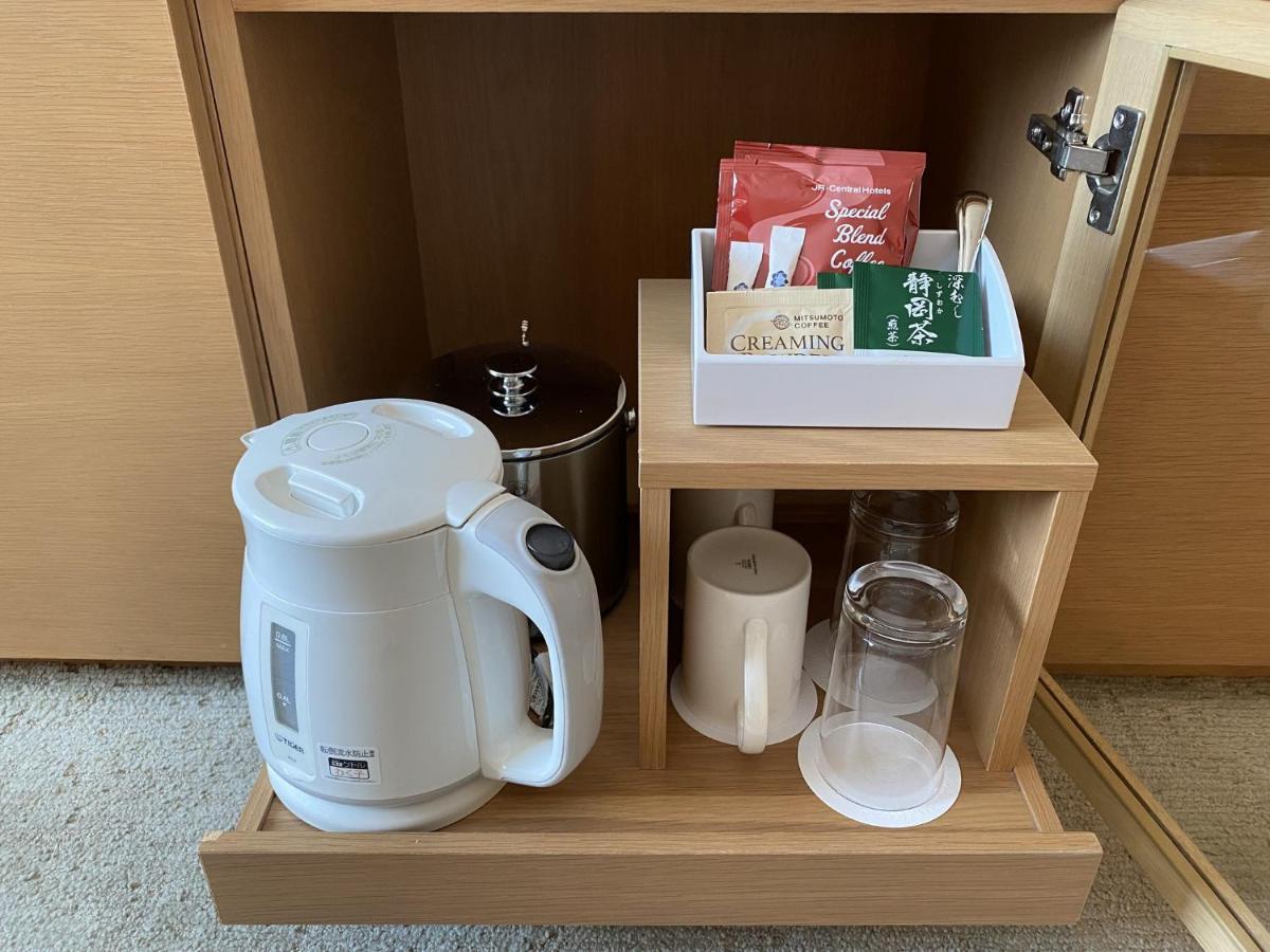 Hotel Associa שיזוקה מראה חיצוני תמונה A tea and coffee making station in a hotel room